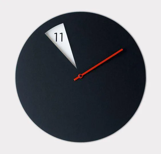 Dark disc clock with a single red hand